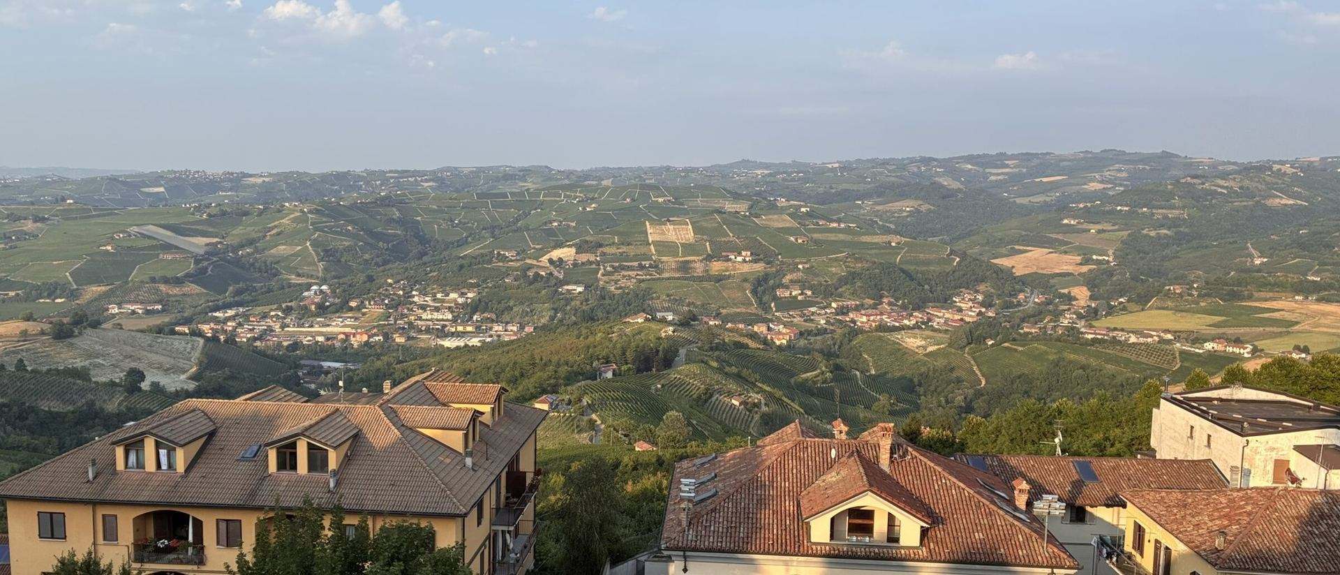 Panoramic view of the Langhe hills, vineyards and villages